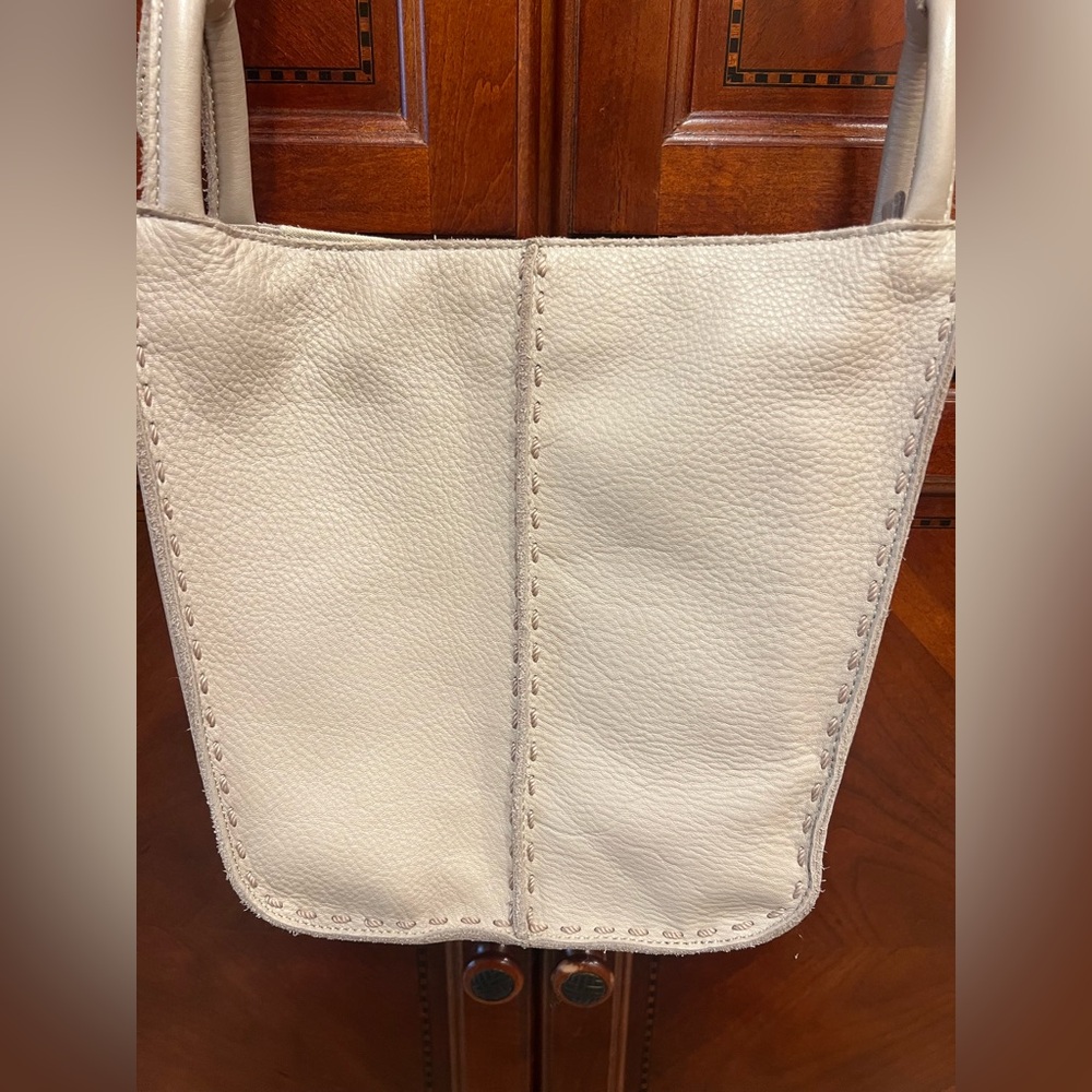 The Sak Cream Crossbody Bag with Pebbled Texture